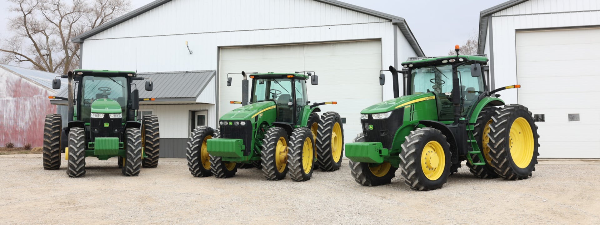 Three Johndeere tractors