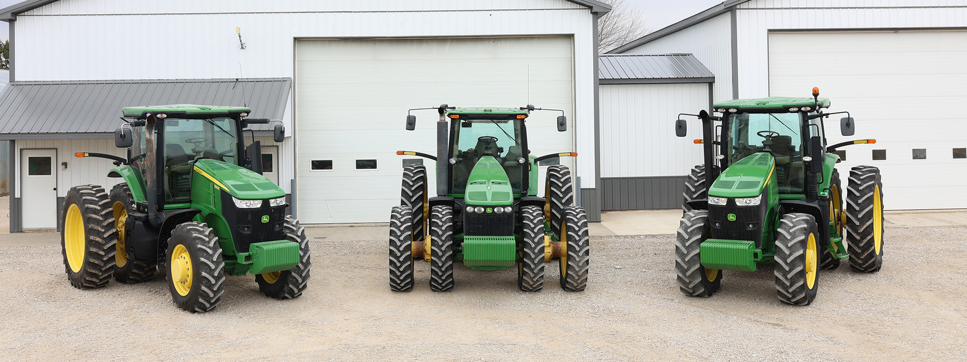 Closer look of the three John Deere tractors